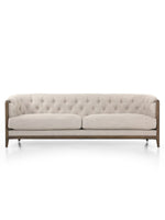 Add timeless elegance to your living space with the Birmingham Sofa. This classic piece boasts rolled arms, button tufting, and a parawood frame for a touch of natural beauty. Upholstered in Alcala Wheat performance fabric, this sofa is both durable and comfortable for long-lasting enjoyment. Overall dimensions are 91.00"w x 36.00"d x 29.75"h.